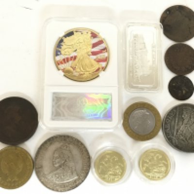 A collection of coins including Queen Victoria 1887 Empire of India Five Shillings, 1 oz Fine Silver One Bollos Commemorative Coin, replica coins, Birmingham Mint 150th Anniversary of the Rainhill Trials 1829-1979 silver ingot, 1835 one quarter Anna. Postage category a