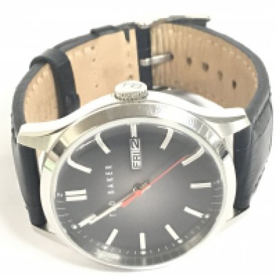 A Ted Baker gents TE10023466 Quartz Watch with a Grey Sunburst Dial and a Day-Date Display Window. This lot cannot be posted