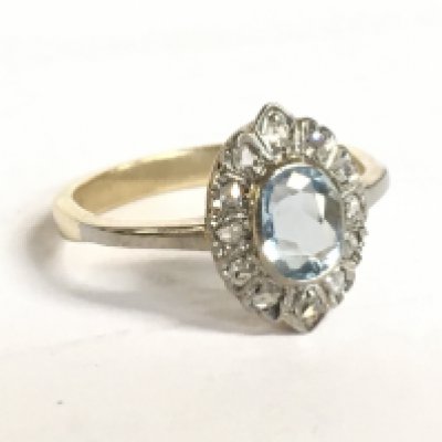 An Unmarked 9 carat gold Art Deco Aquamarine and diamond set ring, 1.99g. Size J. Postage category A