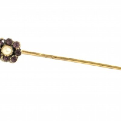 A 9ct gold Georgian amethyst and pearl stick pin. 1.6g Postage category a