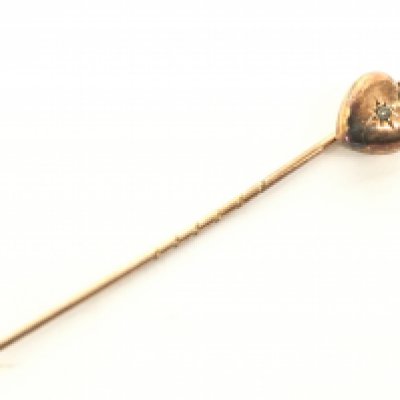 A 9 carat rose gold and diamond heart stick pin, 0.8g, postage category A