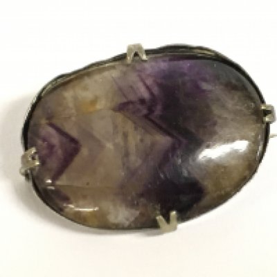 A silver and blue john brooch, postage category A