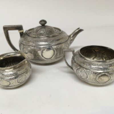 A Quality Victorian silver three piece set with a perfuse pattern Sheffield hallmarks 575g approximately.