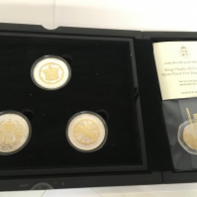 A King Charles III Coronation Silver Proof five pound coin set. Postage category B