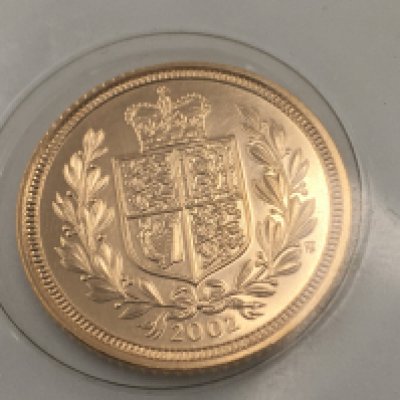 A shield back 2002 half sovereign still in blister pack. Postage cat A.