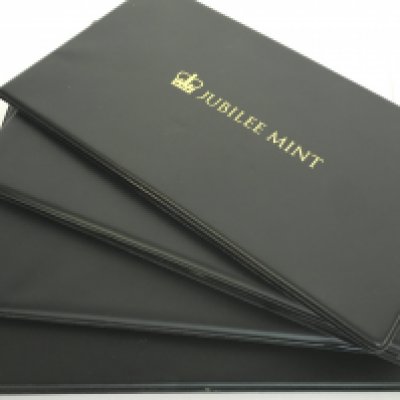 Royal Mint Jubilee Silver Coins in black folders including The 2020 One Ounce Fine Silver Britannia cover, The 95th Birthday Of Queen Elizabeth II Fine silver proof coin cover, The 2019 One Ounce fine silver Britannia cover and a silver plated 70th anniversary of the queens coronation coin cover. Postage category B