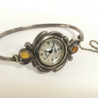 A silver & amber Loytee watch. This lot cannot be posted