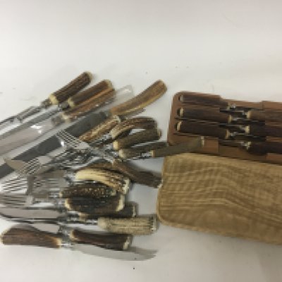 A collection of horn handled stainless steel cutlery Taylor&rsquo;s of Sheffield and a case of conforming steak knifes.