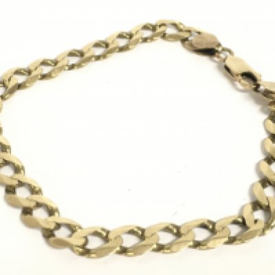 A 9ct gold curb bracelet, 14.2g. Postage category a