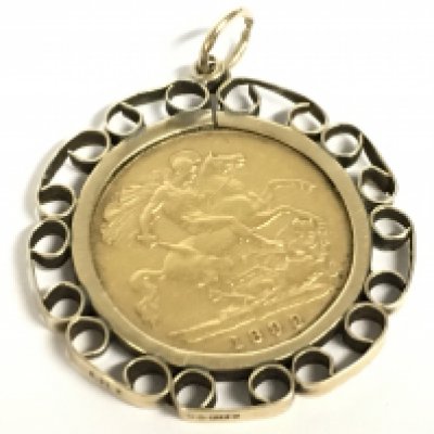 A 1899 half Sovereign in a mount, 5.7g. Postage category a