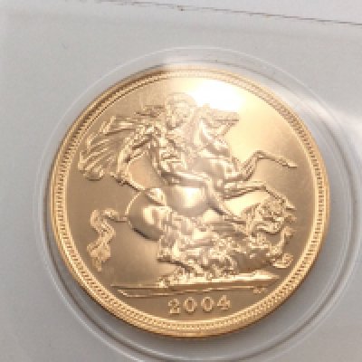 A 2004 full sovereign still in blister pack. Postage cat A.