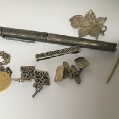 A silver cased Sheaffer American fountain pen silver Celtic design cufflinks a Victorian stick pin mounted with coral and other oddments.