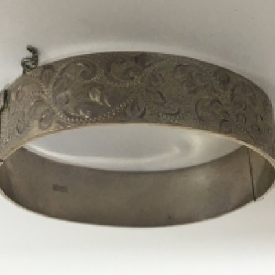 A bright cut silver bangle Birmingham hallmarks weight 35g
