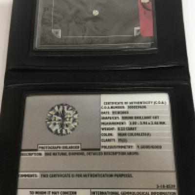 An unmounted brilliant cut diamond 0.23 of a carat. With a certificate of Authenticity Clarity VS(2) colour in a wallet.