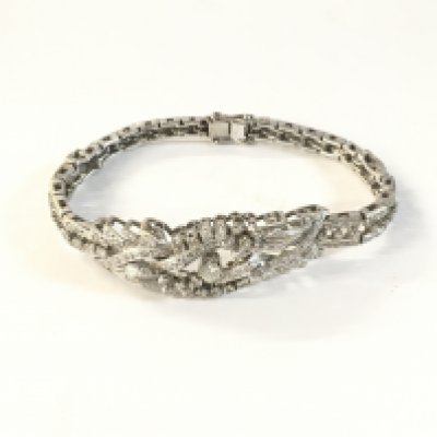An 18ct white gold diamond set bracelet. Approx weight 25.5 grams.