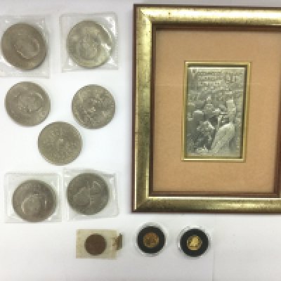 Two small gold proof coins plus other coins and a framed Continental silver plaque of the Moulin Rouge. Shipping category D.