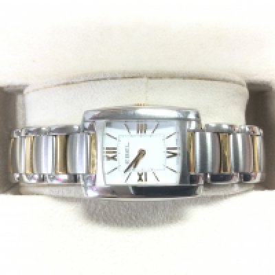 A boxed Ebel Brasilia bi metal watch with associated user guide. Shipping category B.