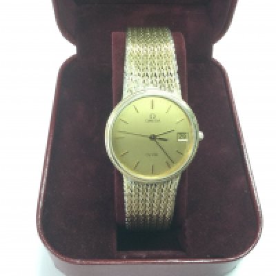 A boxed gent's Omega De Ville date watch with booklet. Shipping category B.