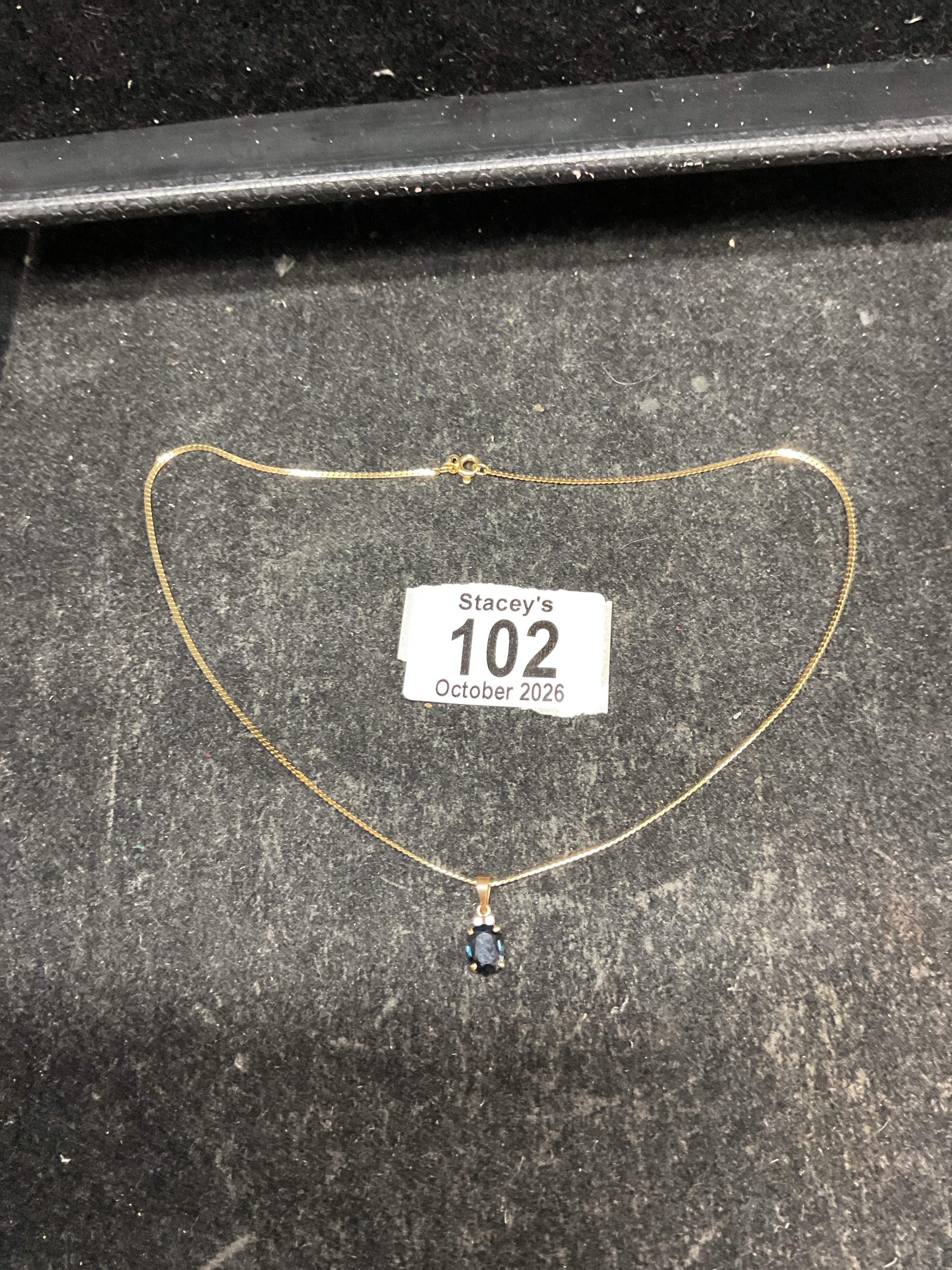 14 k gold necklace and Sapphire and Diamond pendant. Weight 3.4 grams.