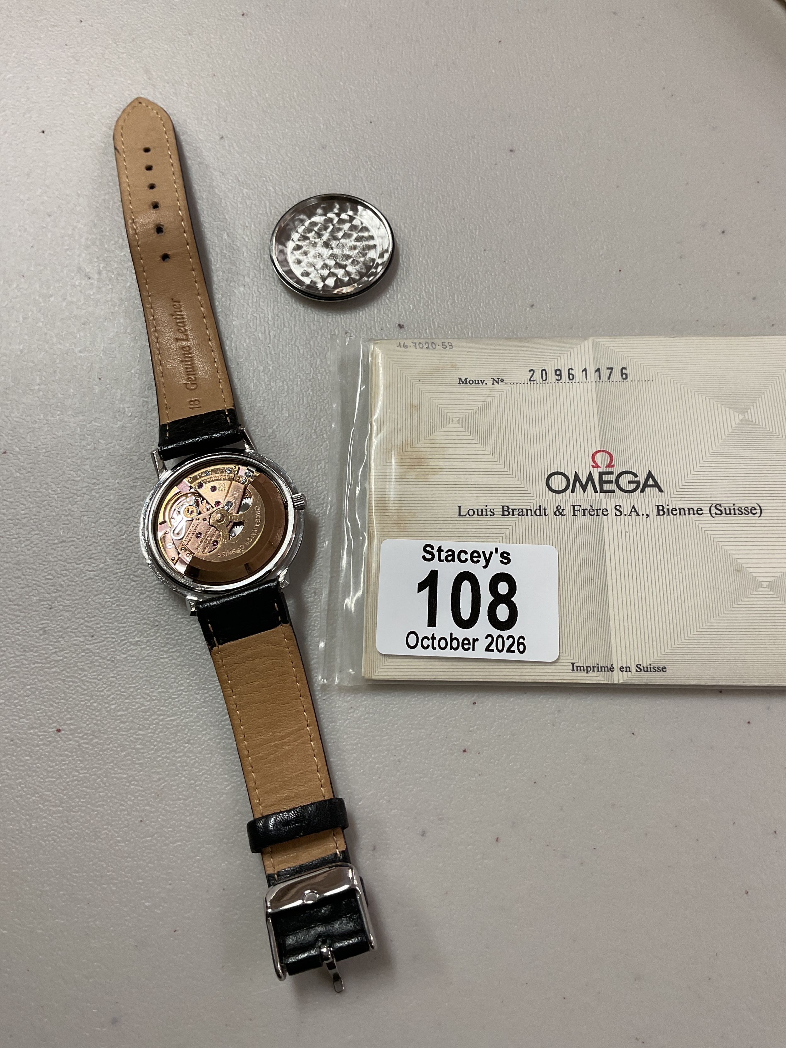 Omega 1964 Turler Constellation, Ser No 20961176, 24 jewel 561 cal.with omega winder and original glass, along with paperwork.