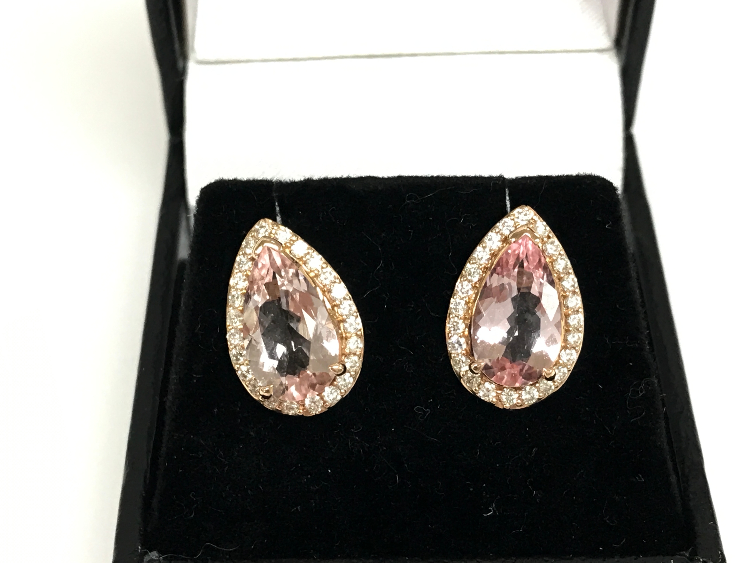 A pair of rose gold pear shaped morganite and diamond cluster studs. Morganite 3.43ct and diamonds 0.56ct.
