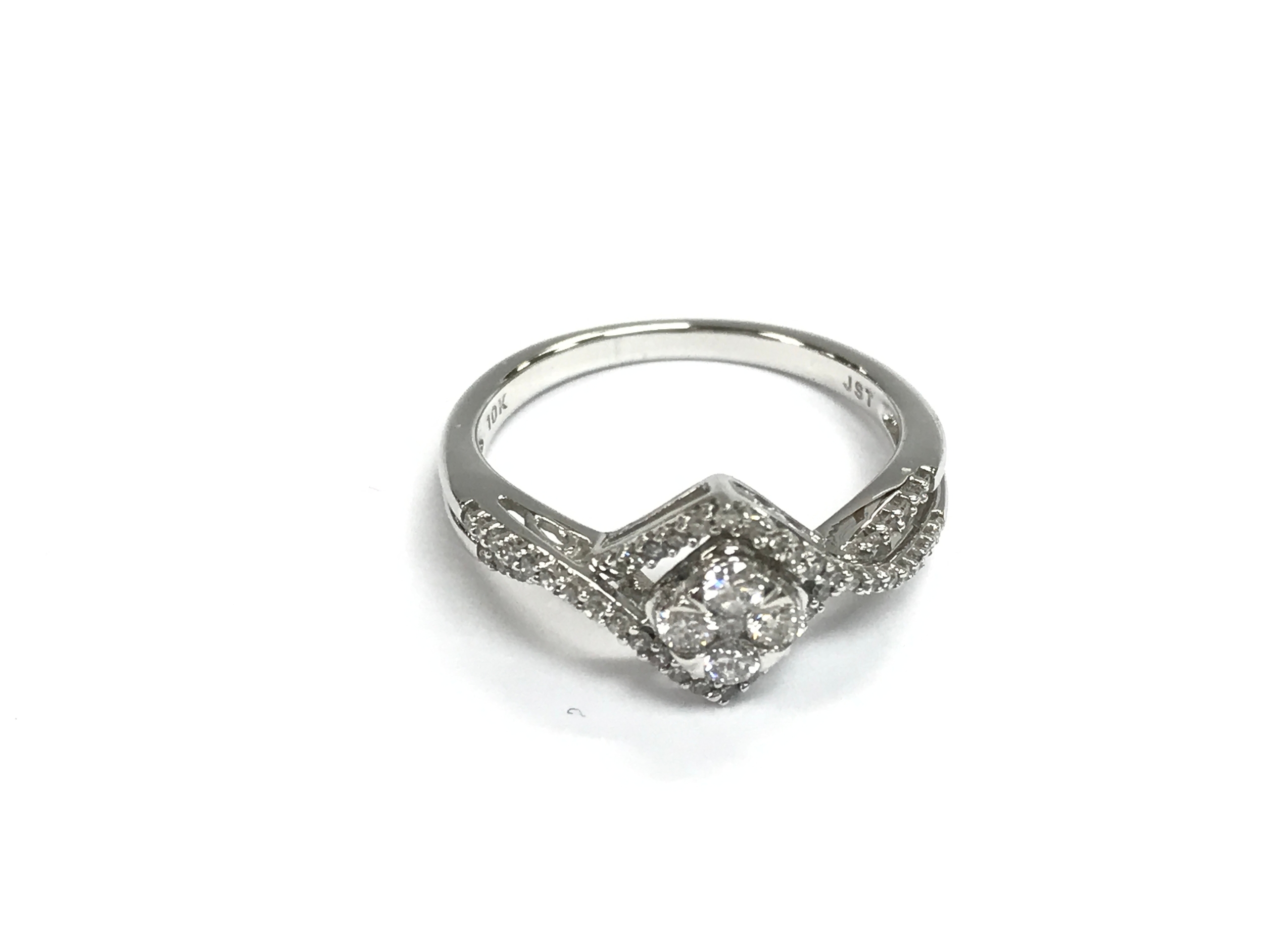 A 10ct white gold diamond cluster ring. Size L 1/2.
