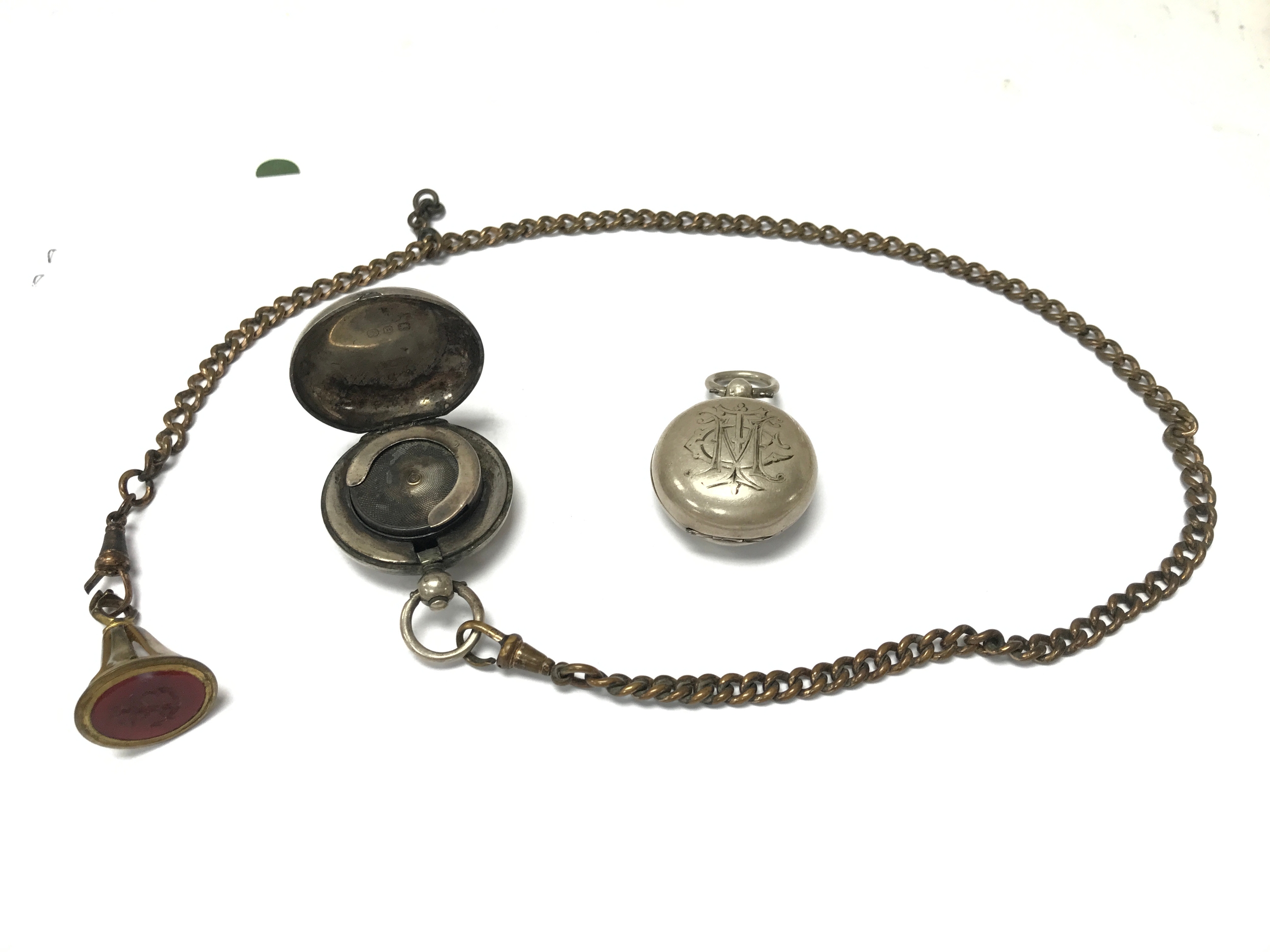 Two hallmarked silver sovereign holders