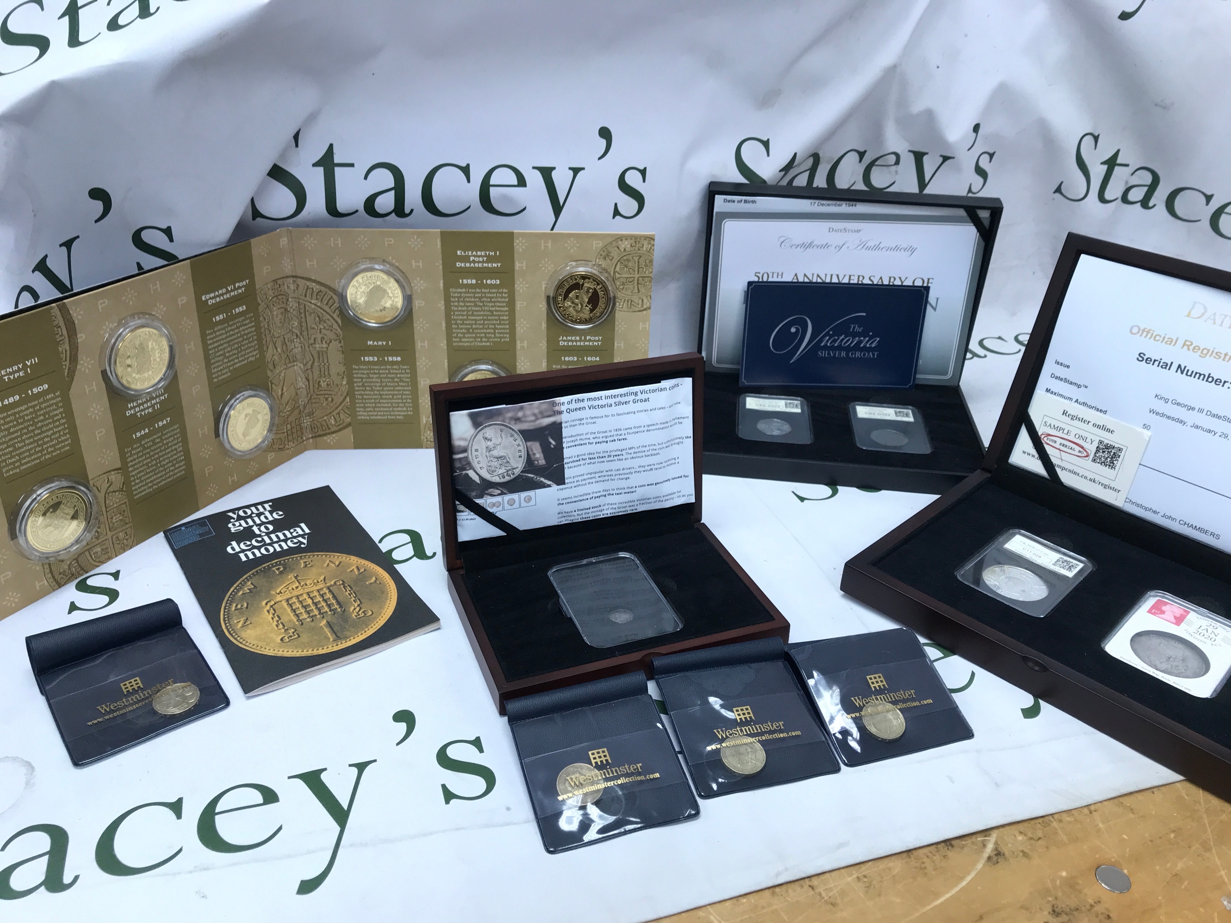 A Collection of coin sets, groat, 50p, £1 and crown