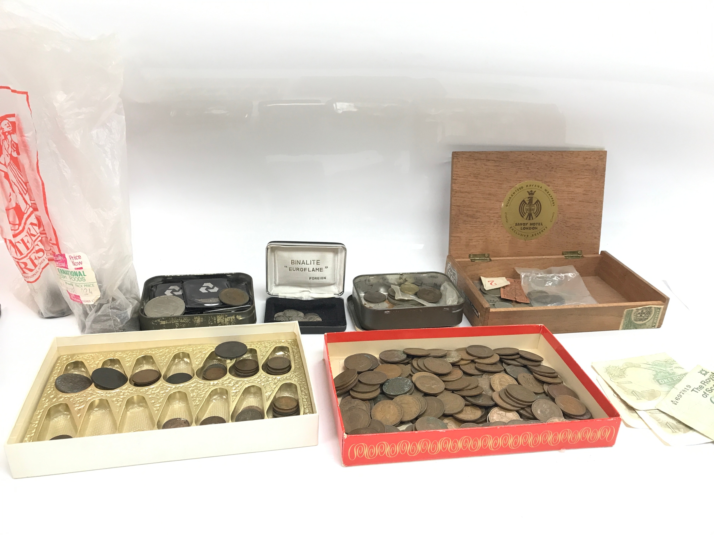 A collection of world coinage and small amount of notes