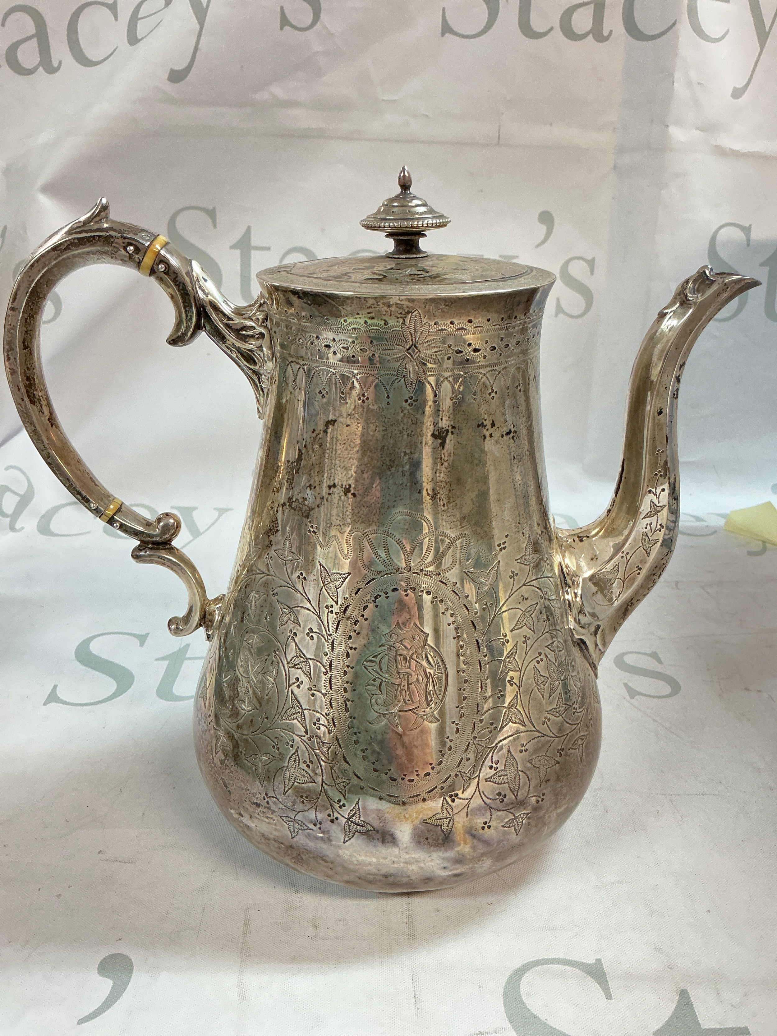 19th century Victorian hallmarked silver water jug featuring engraved designs. Total weight 710g.