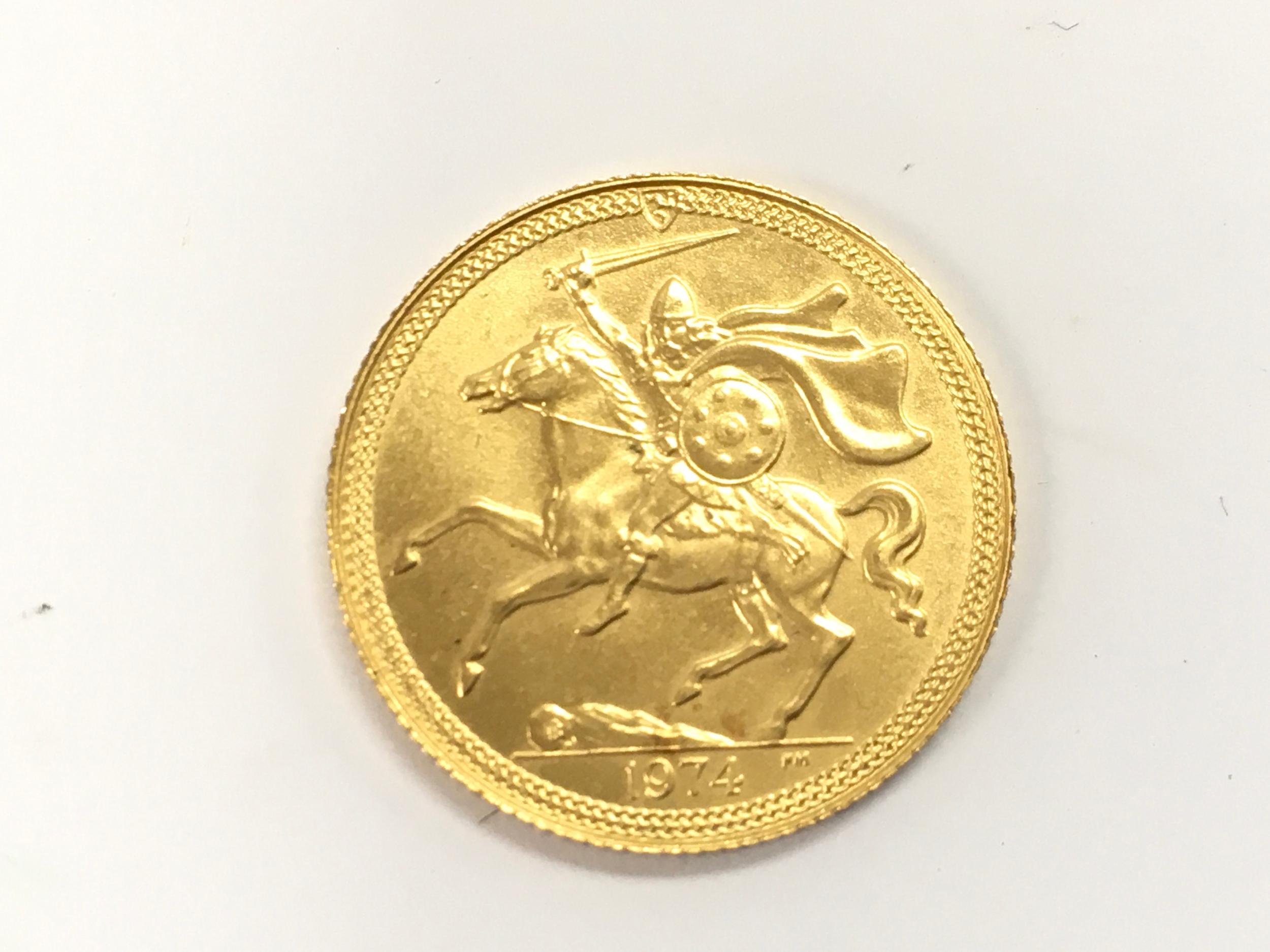 A 1974 isle of man sovereign.