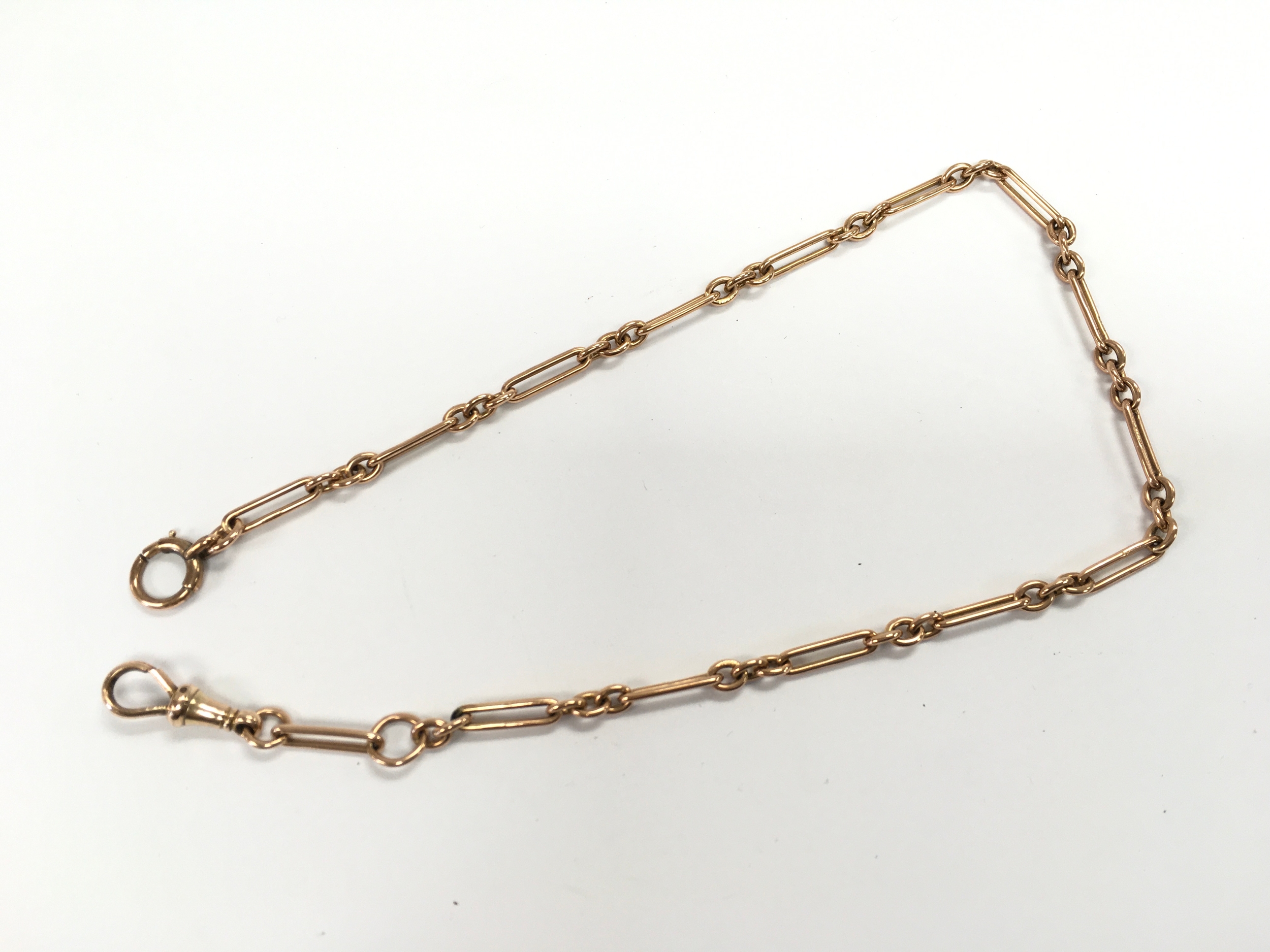 A 9ct gold watch chain. 18.42g and 39cm length.