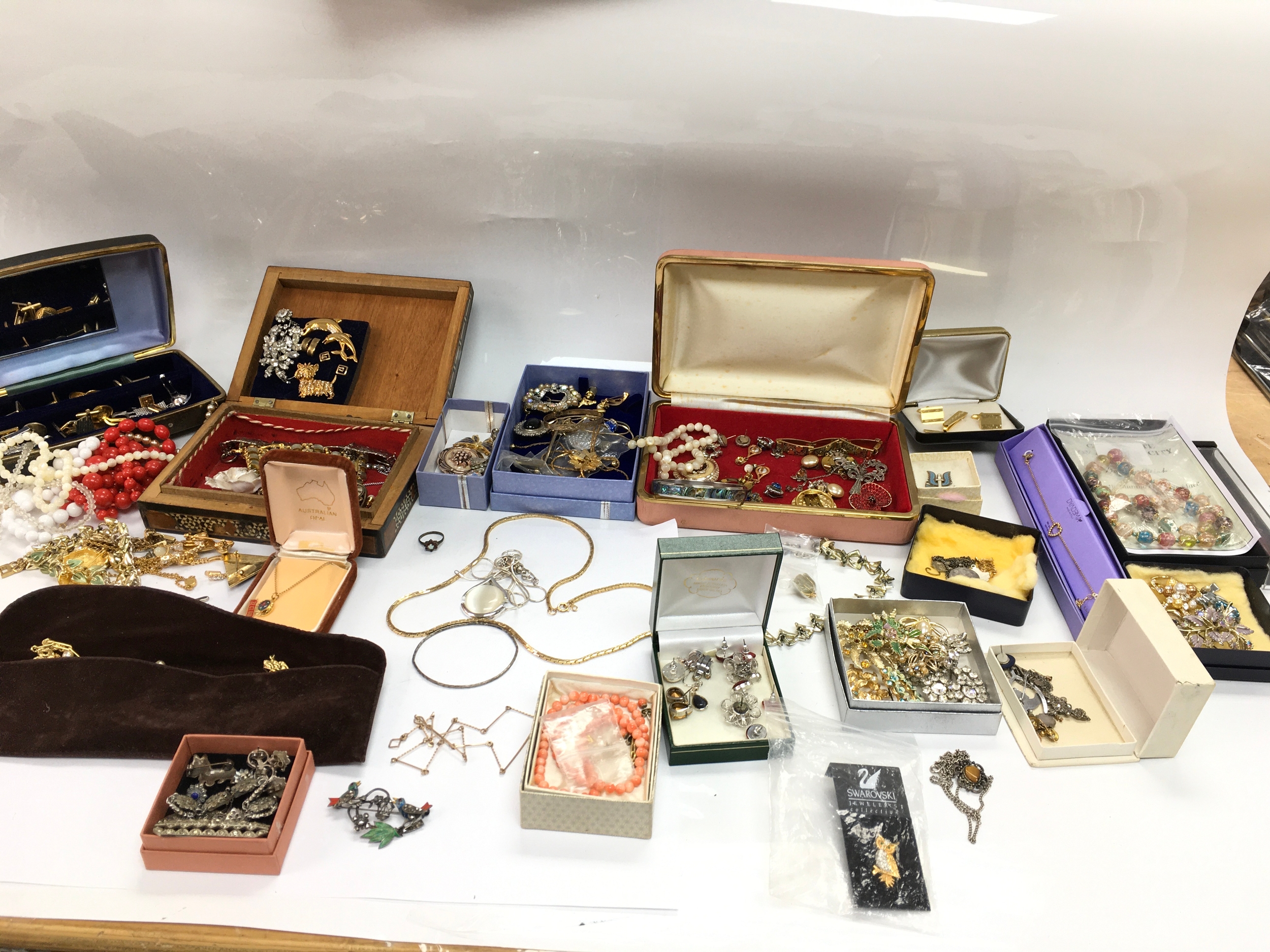 Large collection of assorted costume jewellery including numerous silver items.
