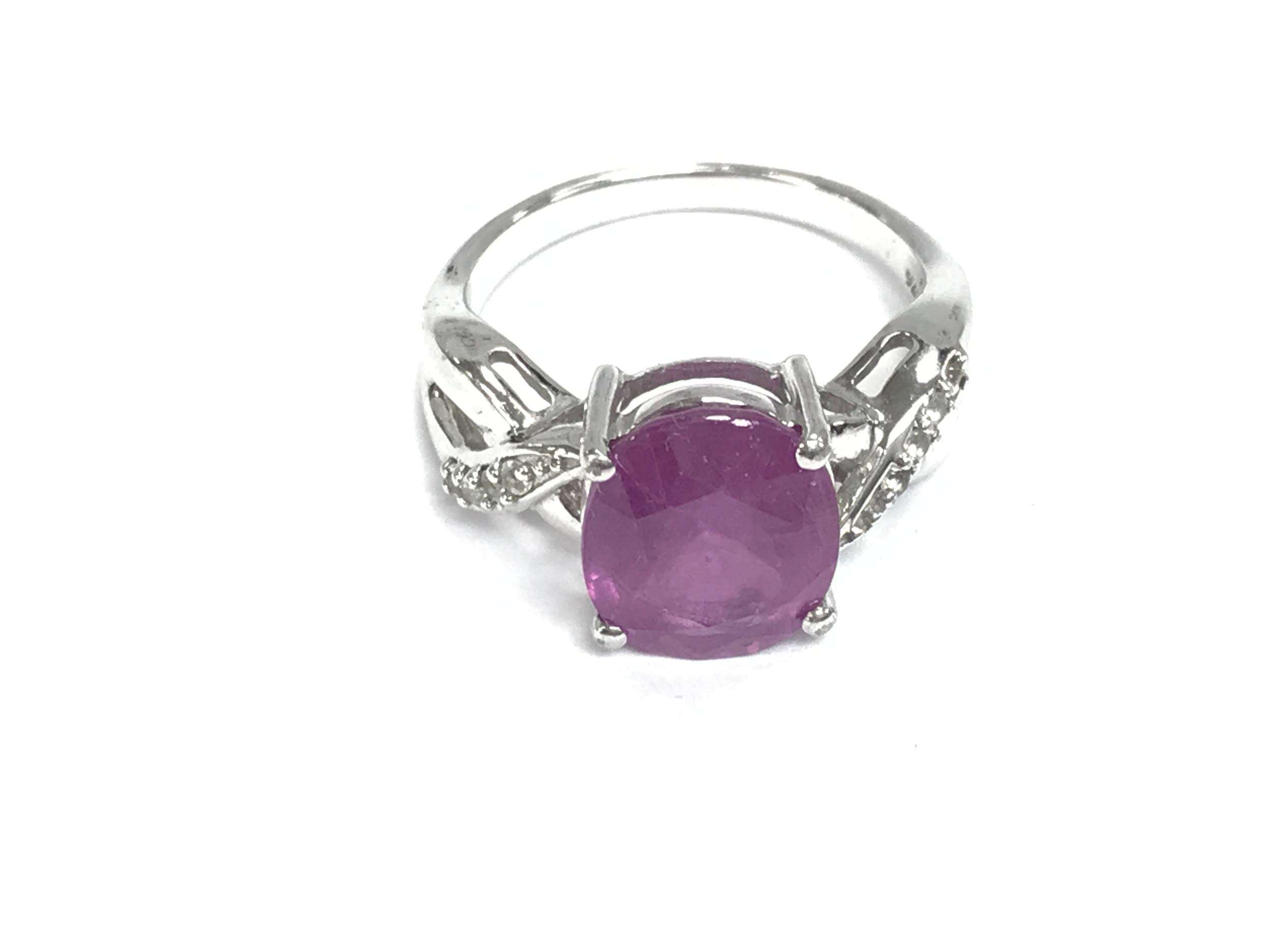 Silver ring set with hot pink sapphire and white topaz. Size R 1/2