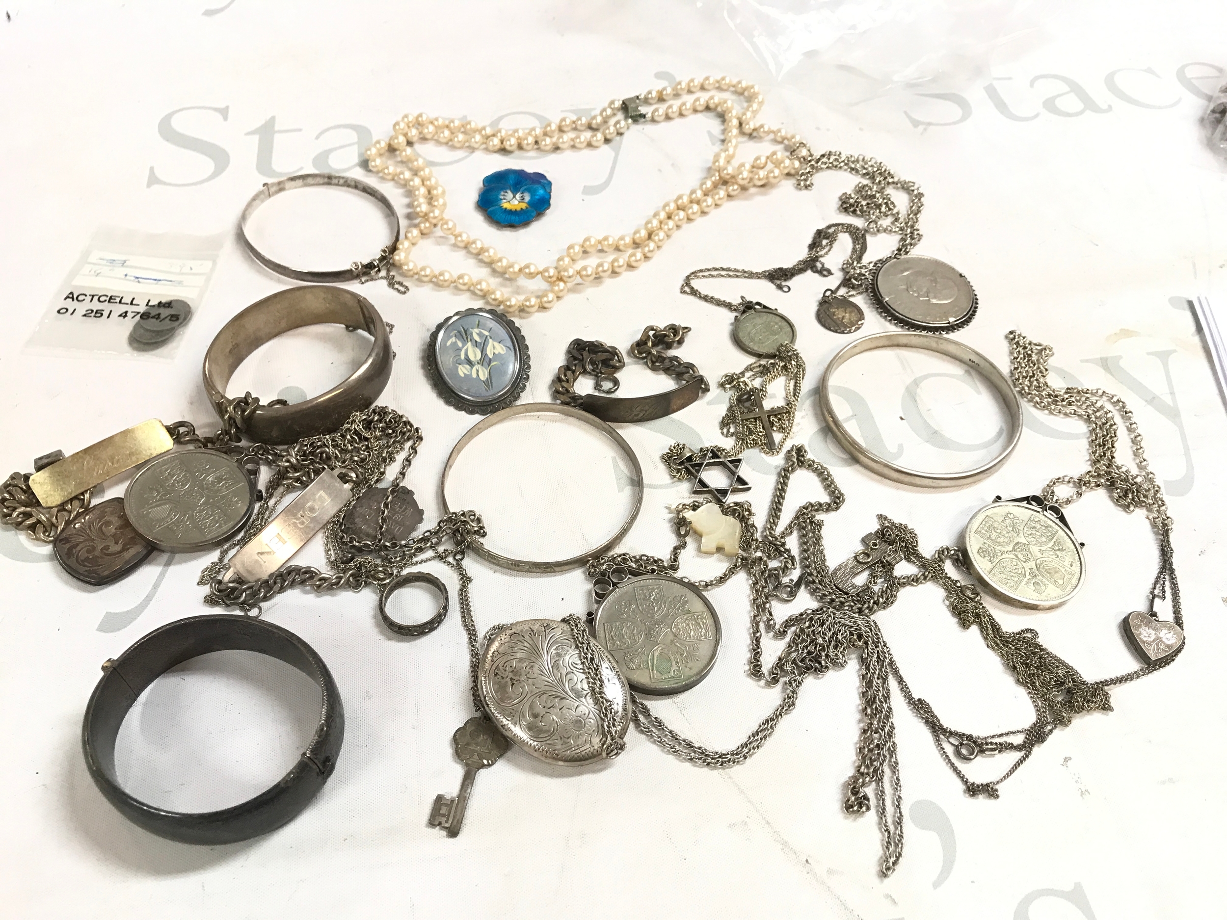 A quantity of silver bangles, necklaces etc 