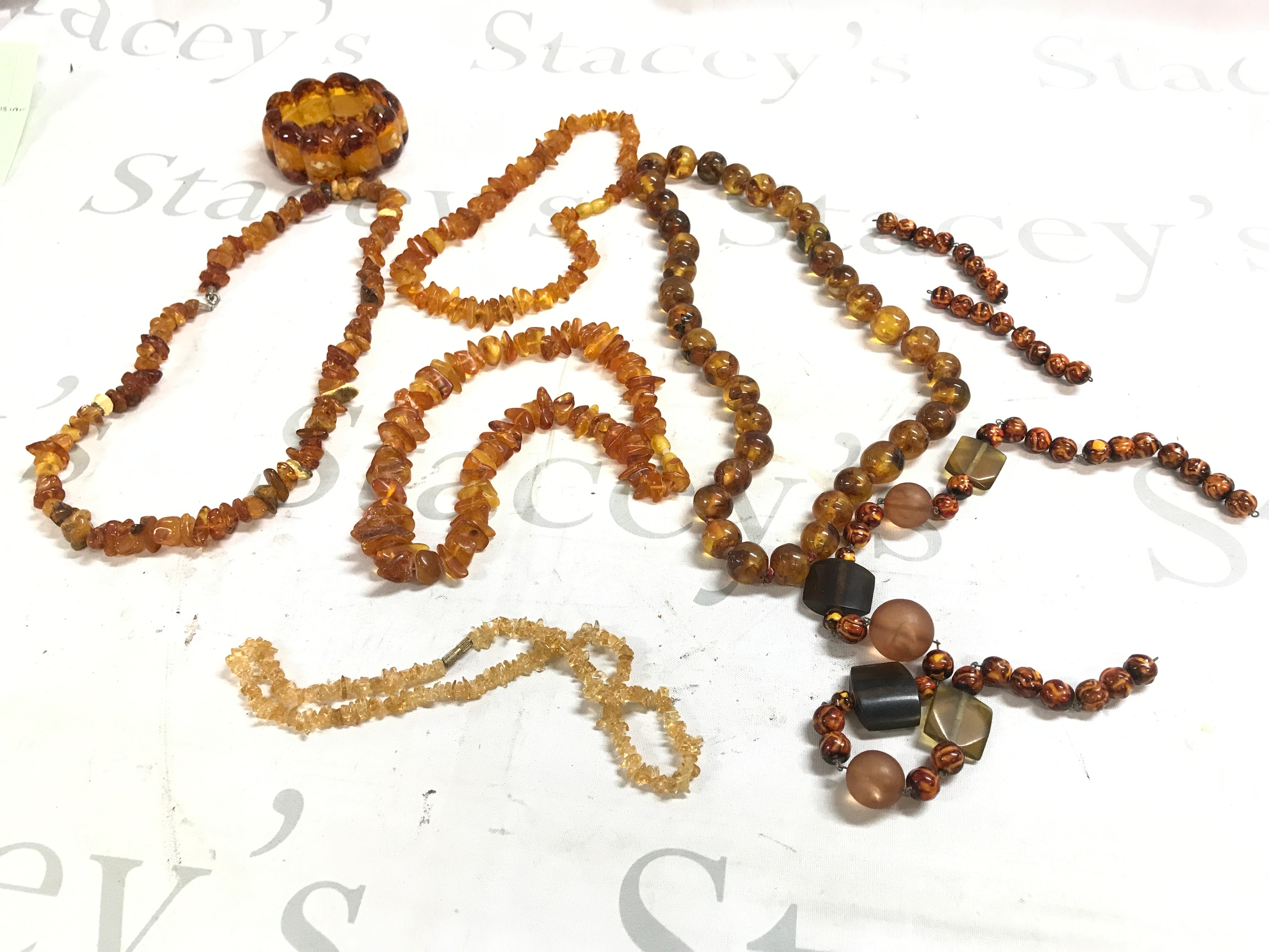 A collection of amber jewellery including bangles, necklaces etc. 380g total weight 
