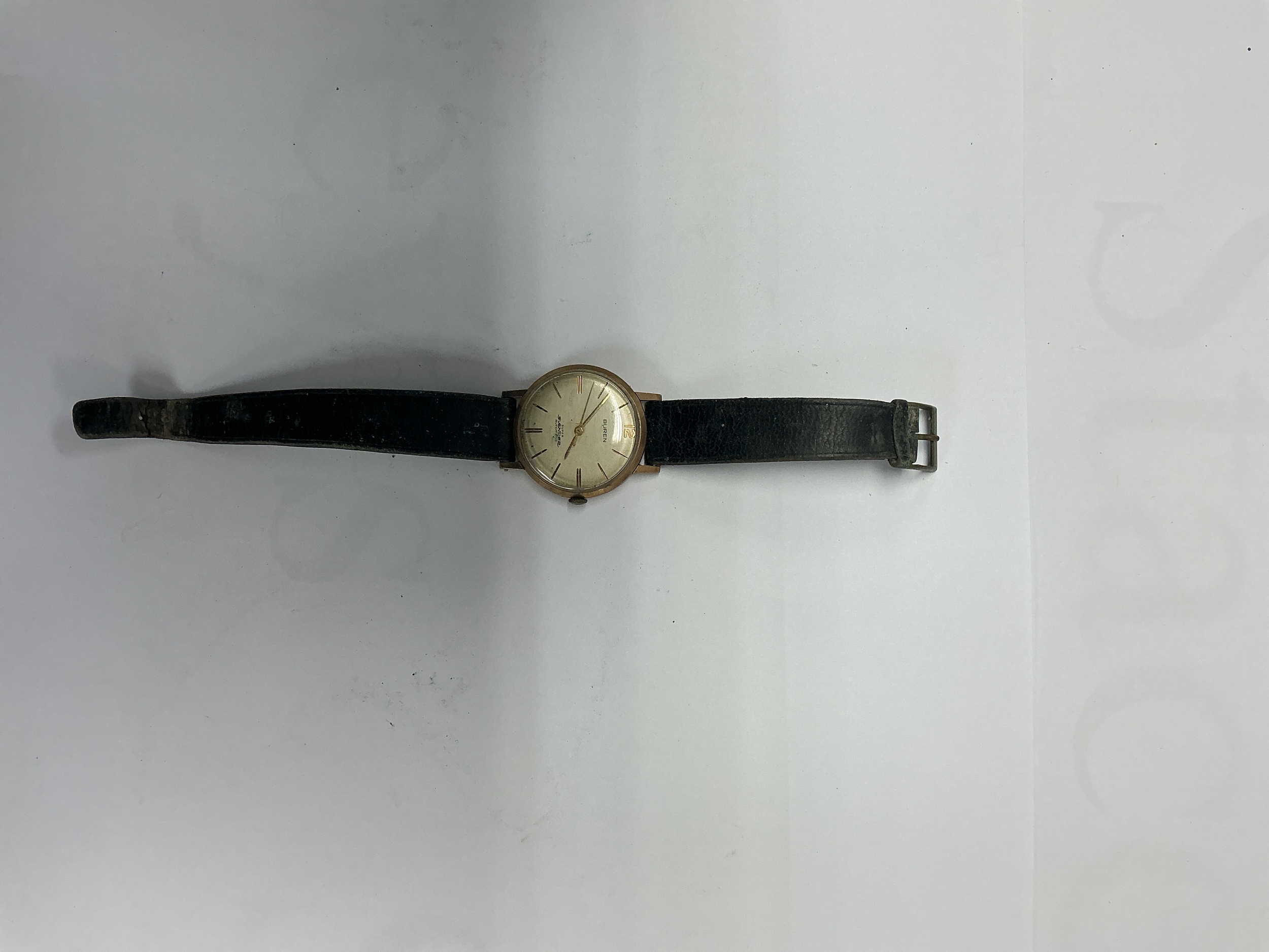 A gent's vintage Buren Super Slender wristwatch, having yellow metal case. Approx 21.5 x 3cm face 29.3G