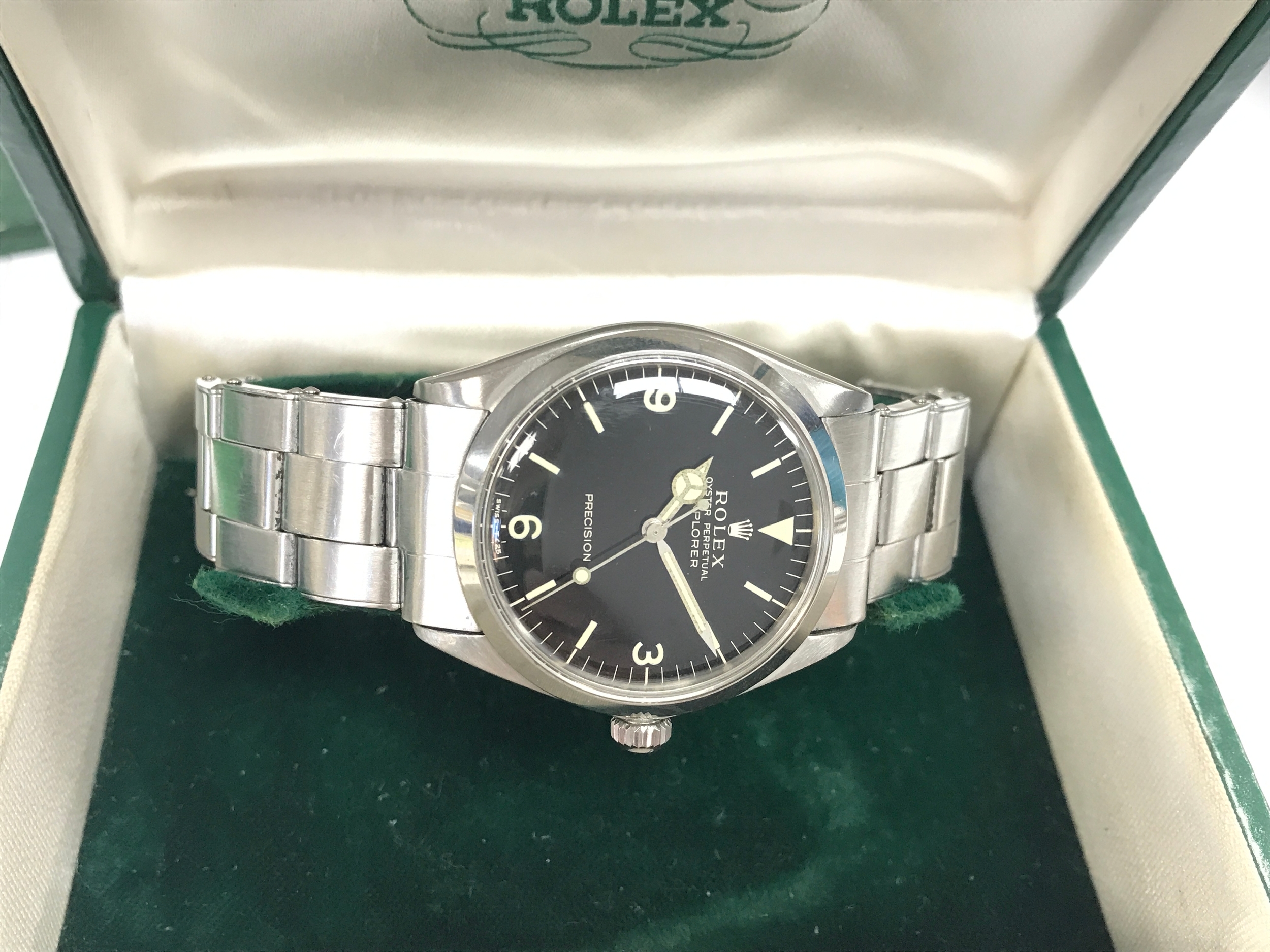 Vintage Rolex Ref. 5500 featuring a distinctive black dial with iconic 3-6-9 Arabic numerals. Comes complete with box, guarantee and service book and vintage 1978 service boxes. Winds and runs. Lovely age to hands.