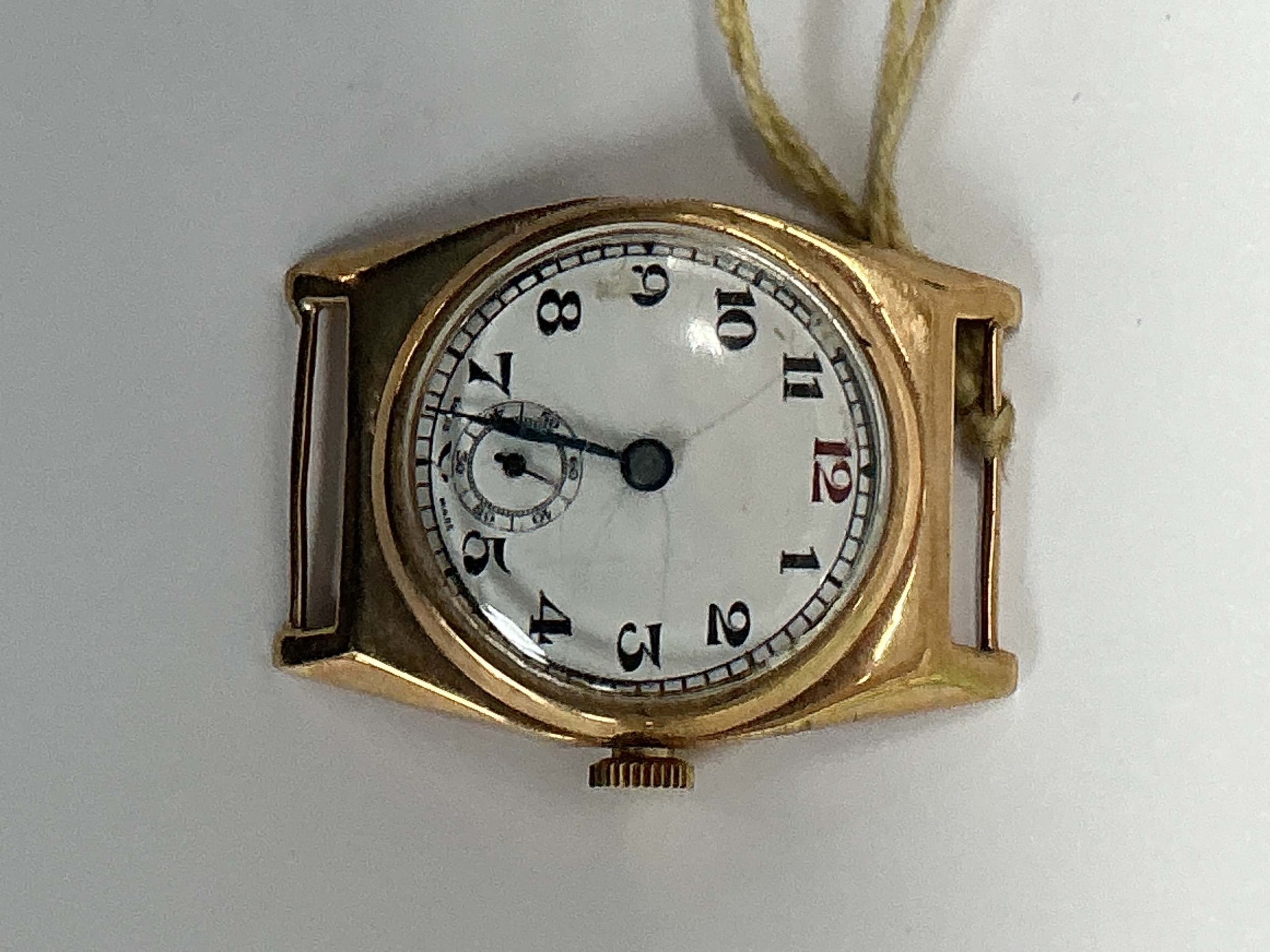 A vintage, Swiss made gold watch face.Approx: 3.5x 3.5cm.15.63g