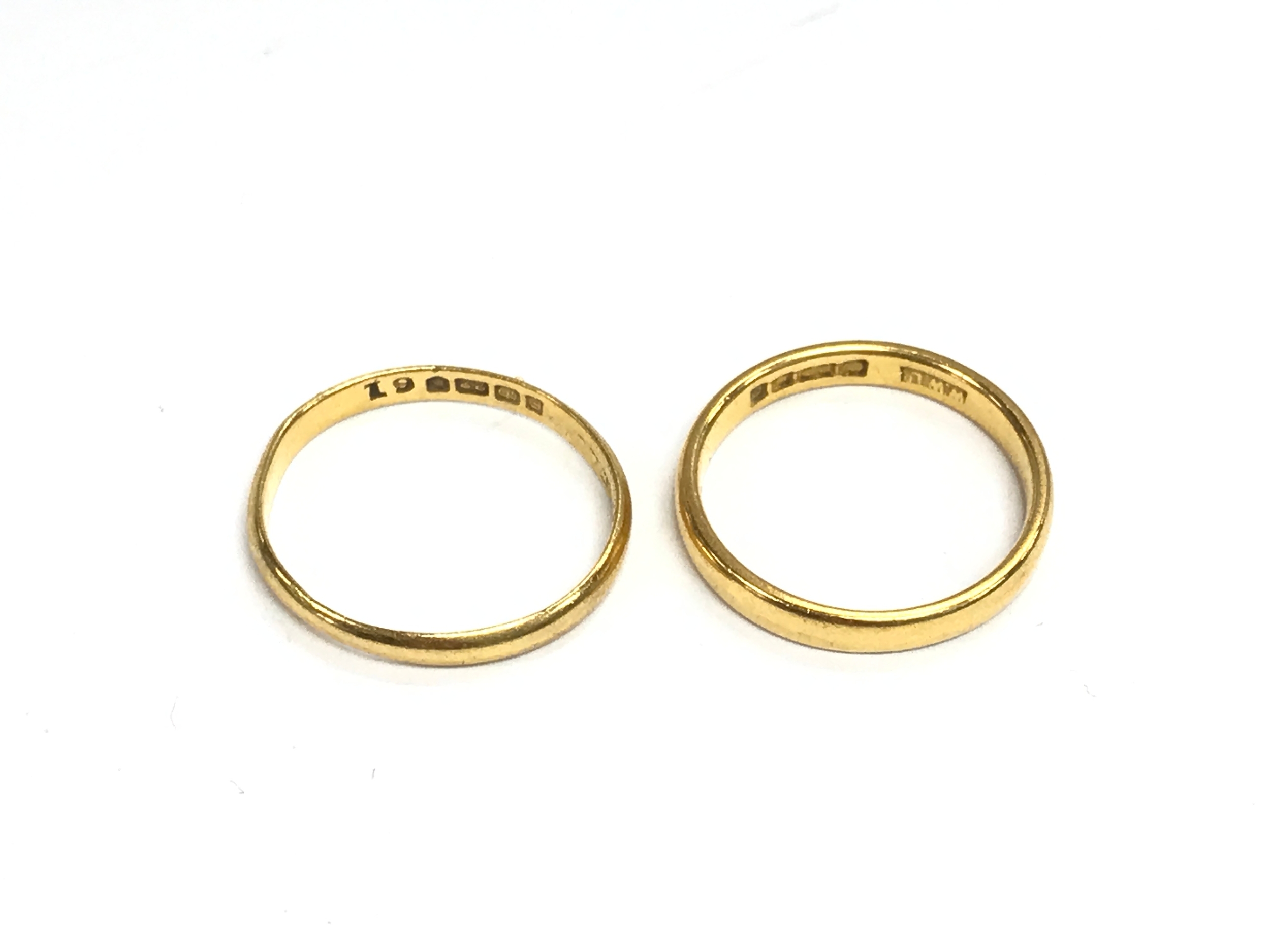 Two 22ct gold wedding bands. 4g