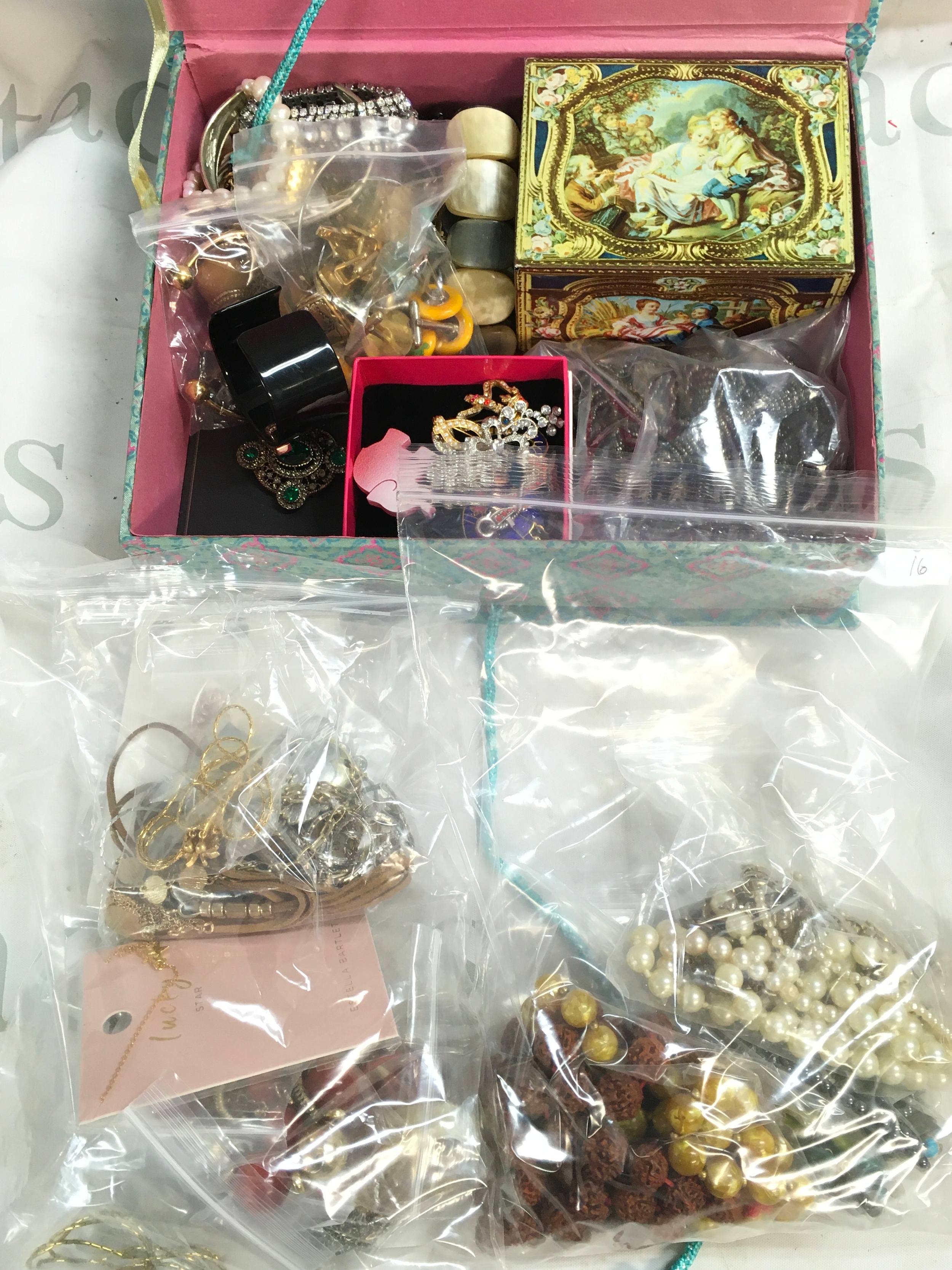 A big box of costume Jewellery 50 pieces of earrings Approx 30 bracelets, 20 pieces of good cufflinks 