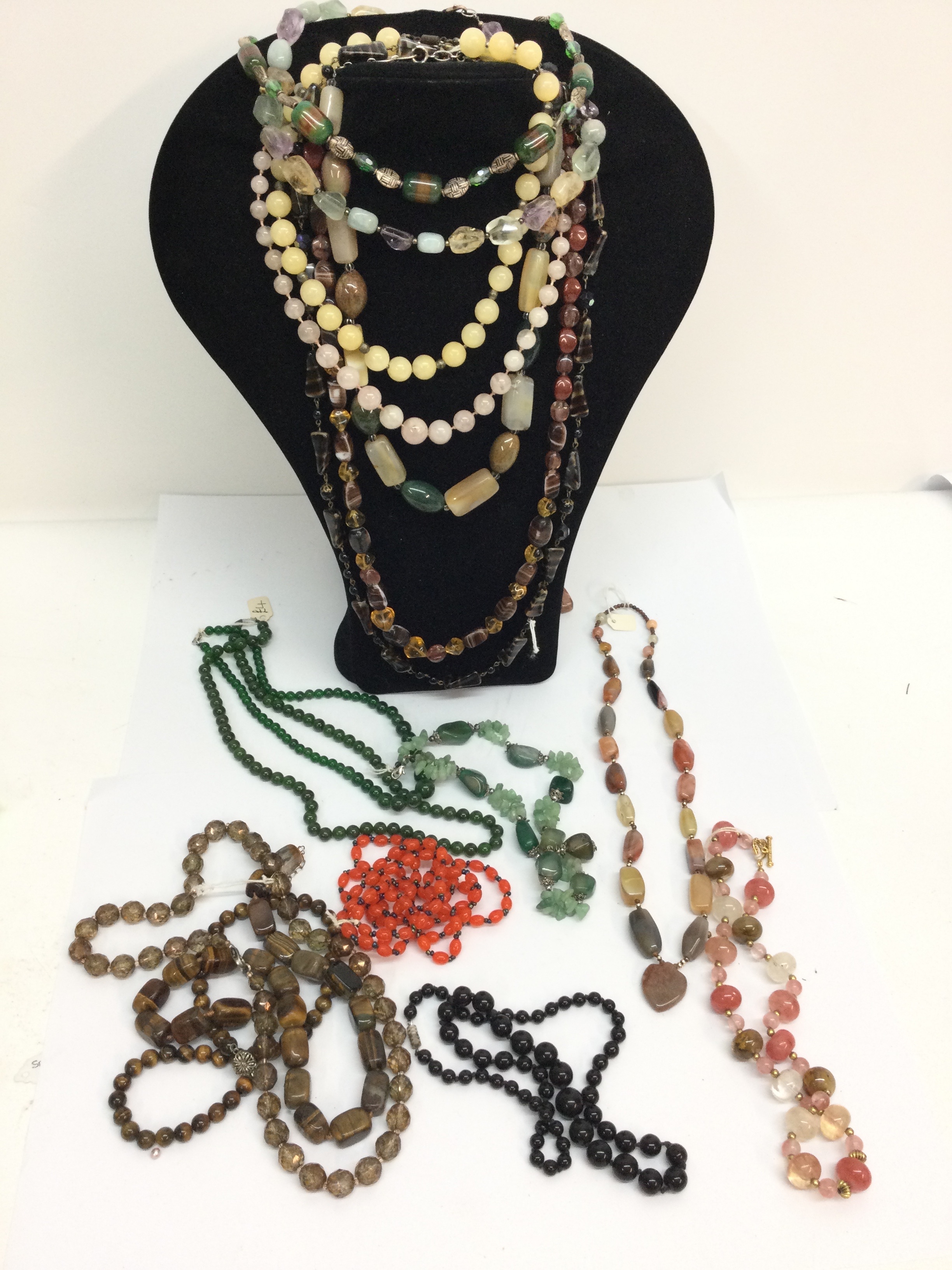 A collection of polished hardstone bead necklaces including Tiger's Eye. NO RESERVE