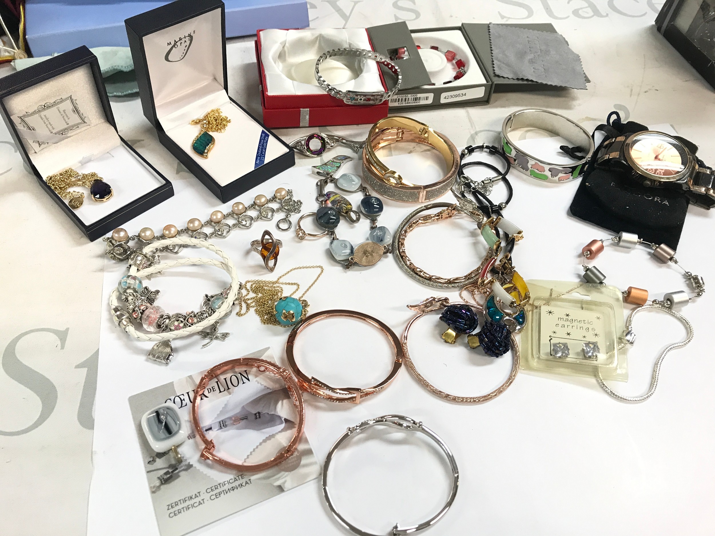A collection of costume jewellery including bangles, Pandora, silver jewellery etc