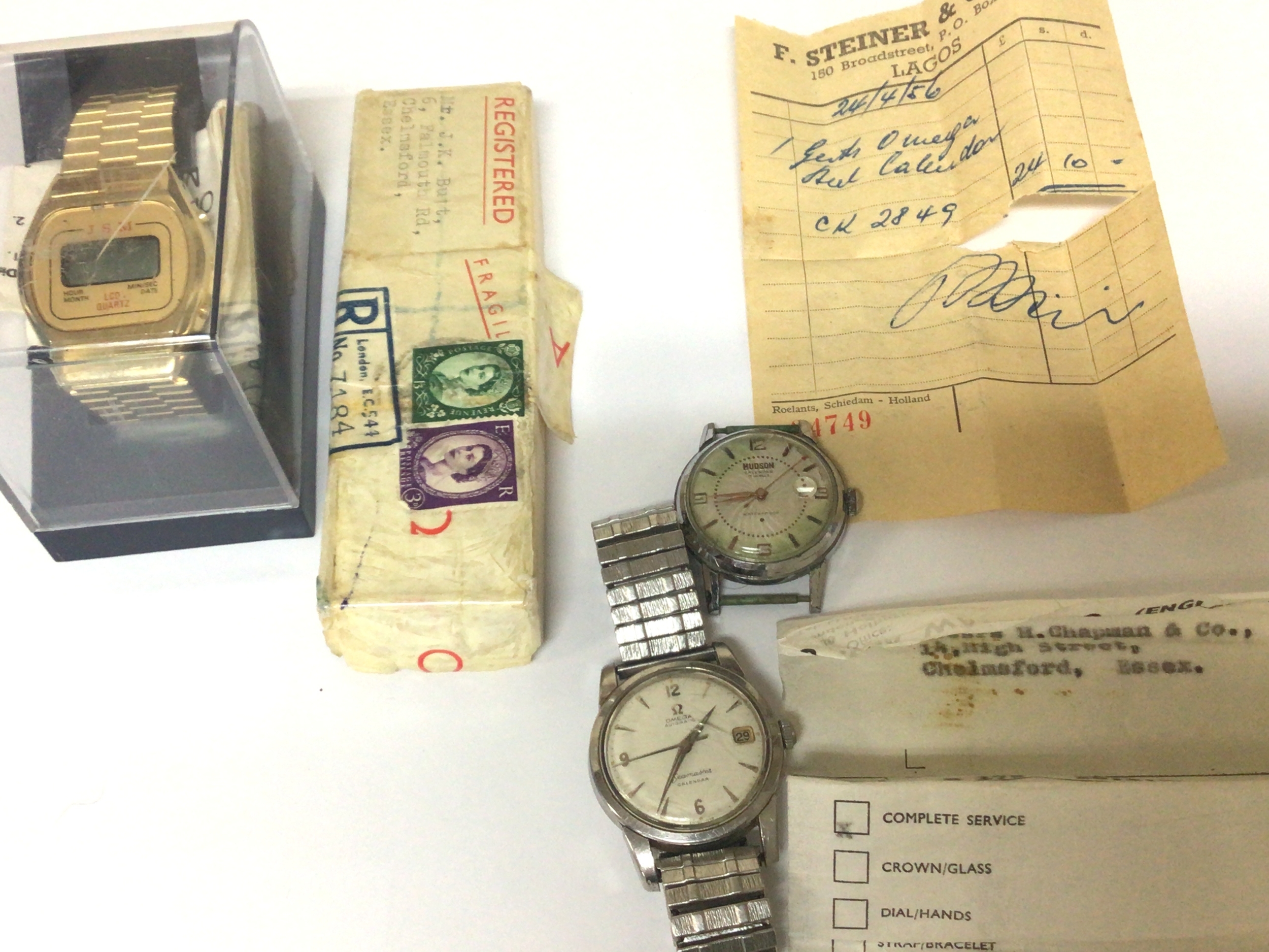 A Vintage Gents Omega sea master Automatic Calendar seen working with original paperwork case Ref as seen on both paperwork CK 2849, receipt dated 1956 seen working with a box replacement strap a Swiss manual wind Hudson watch seen working and a JSM quartz digital LCO watch.