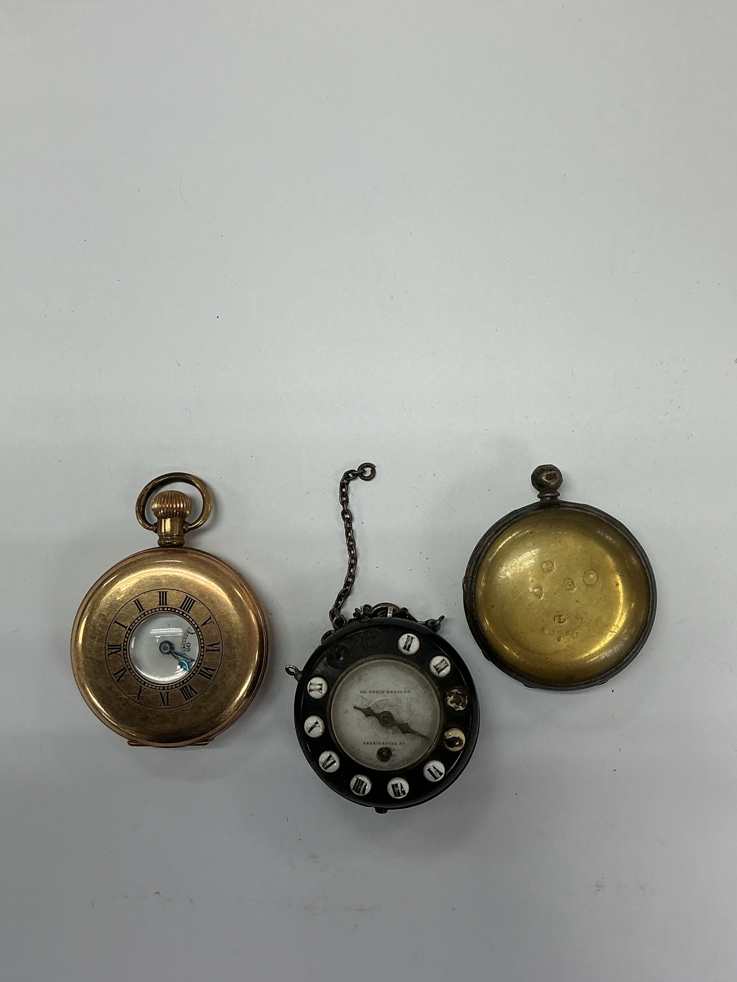 A gold plated half hunter pocket watch, an Oudin Brevete example plus an empty silver watch case. Offered for spares and repairs 