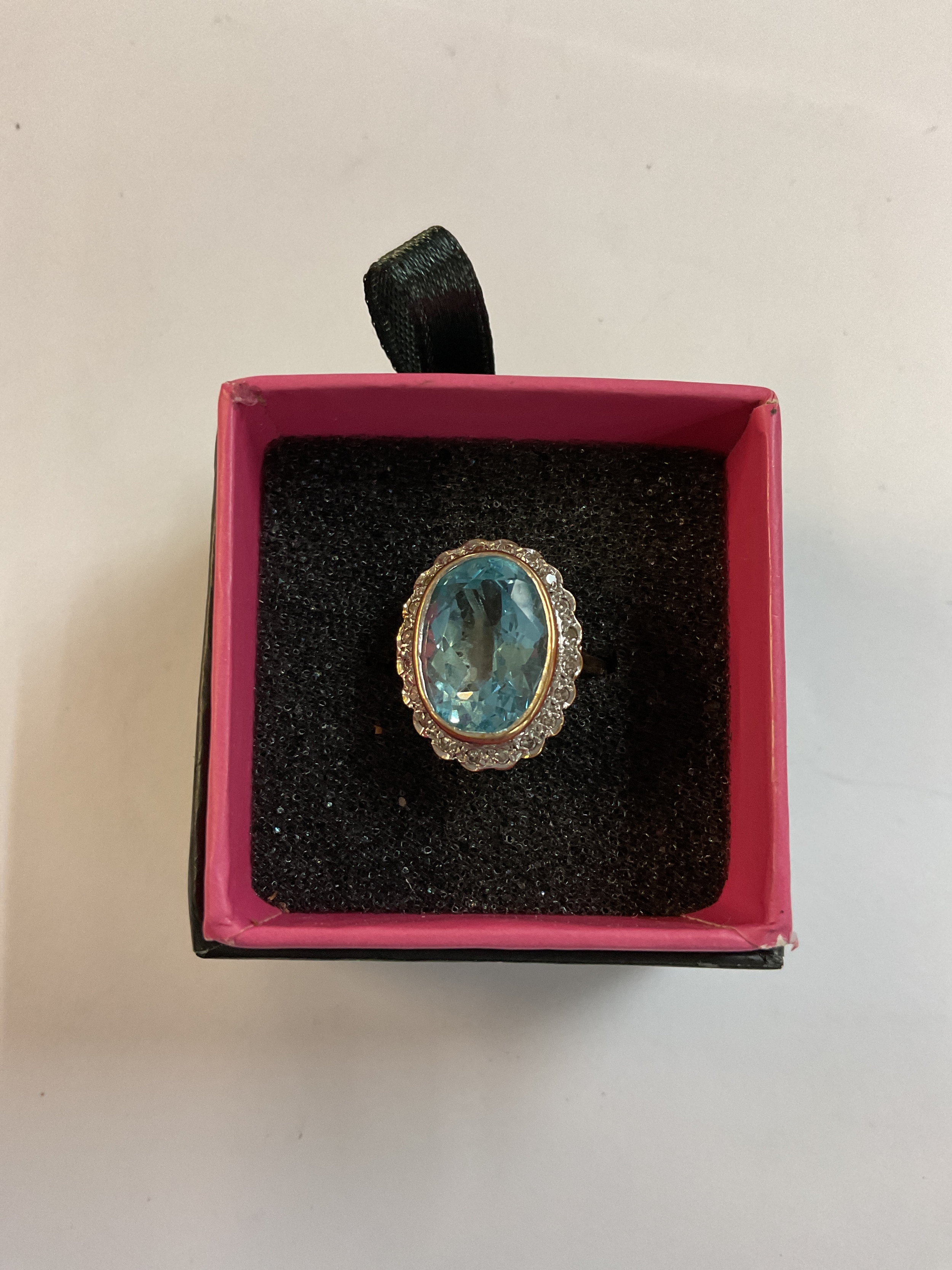 Antique style Aquamarine ring with Diamond surround in yellow 9 ct gold