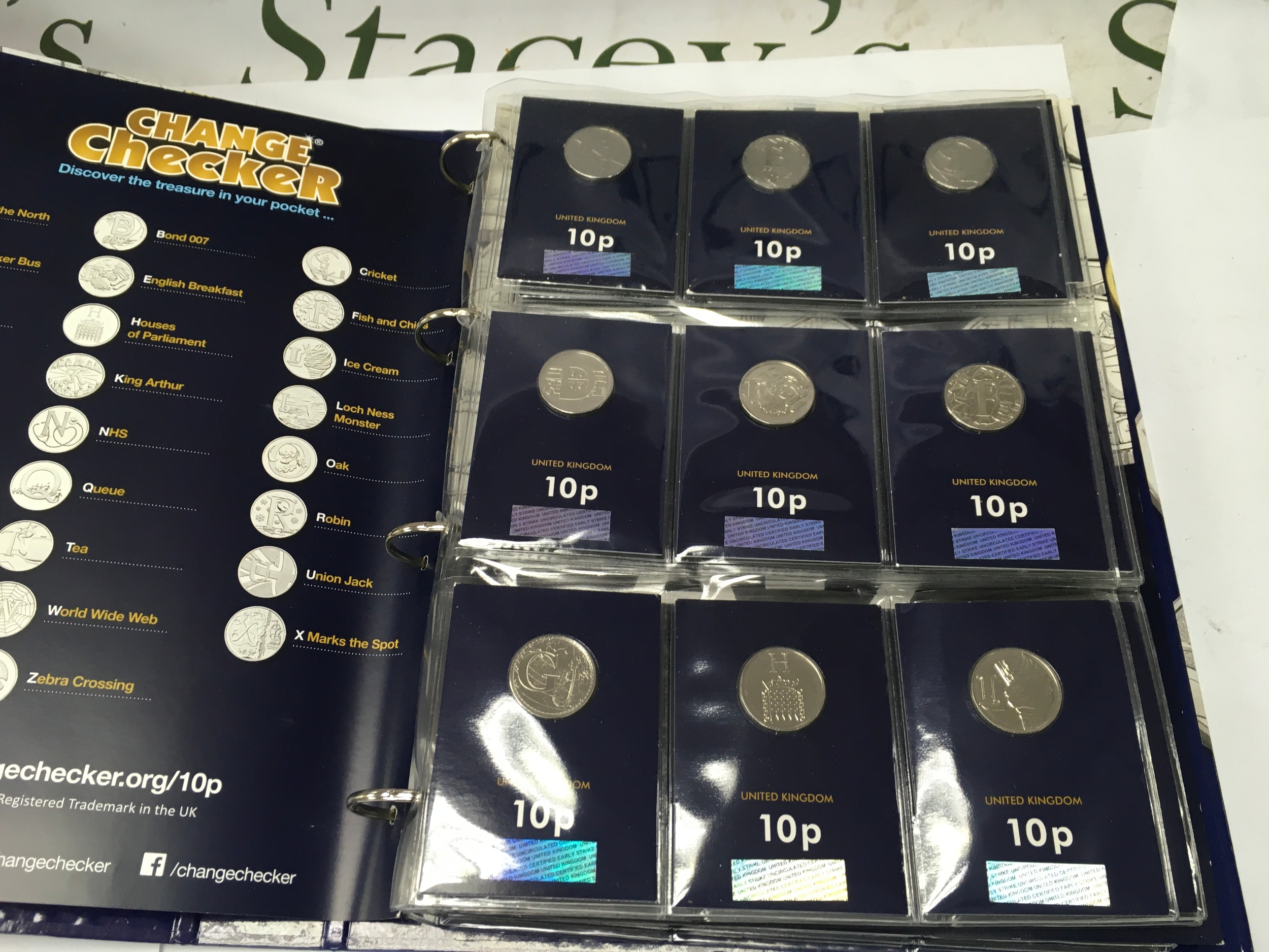Album containing two complete sets of 26 UK A–Z 10p coins with completer coins.