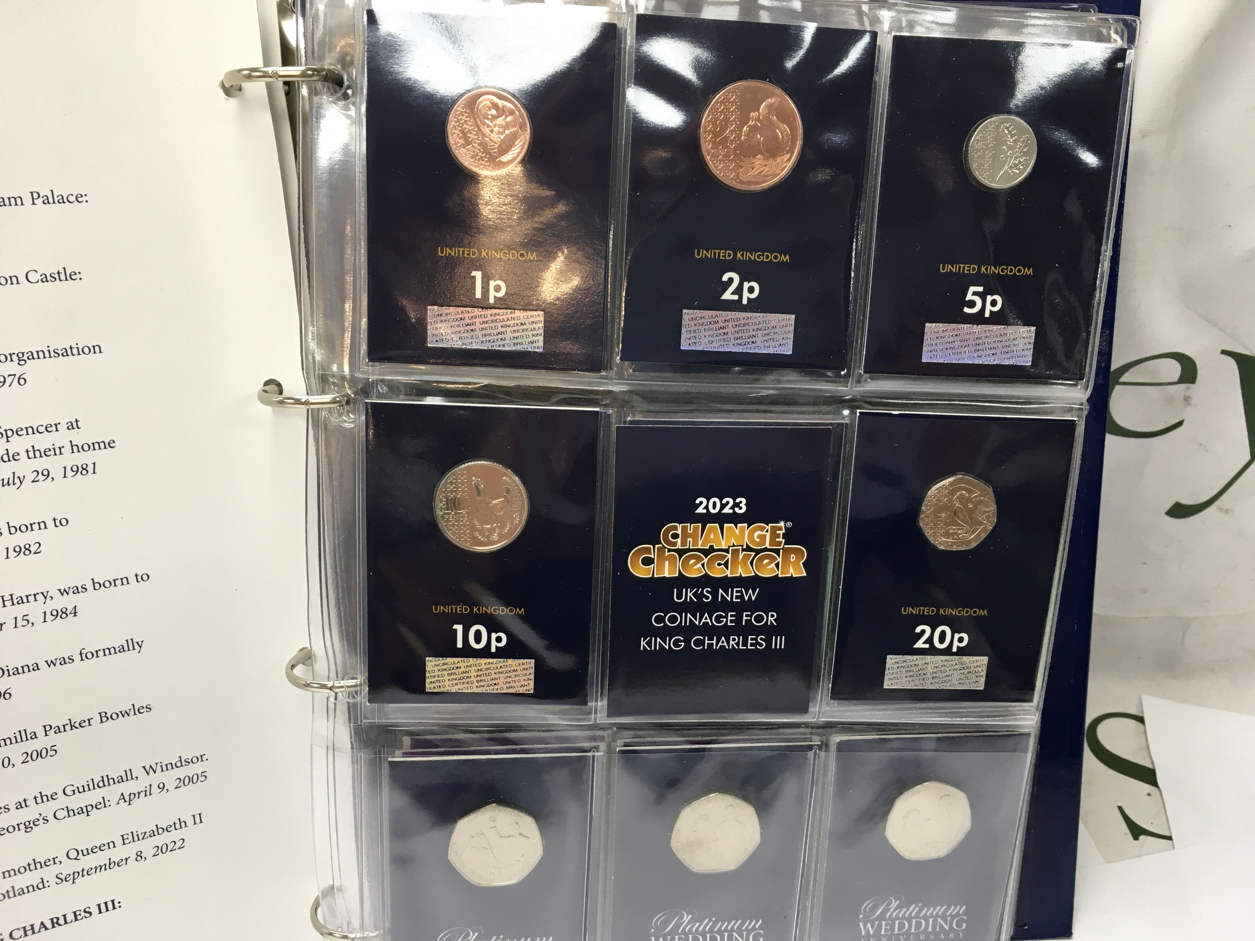 An album containing assorted coinage including uncirculated 50ps and other.