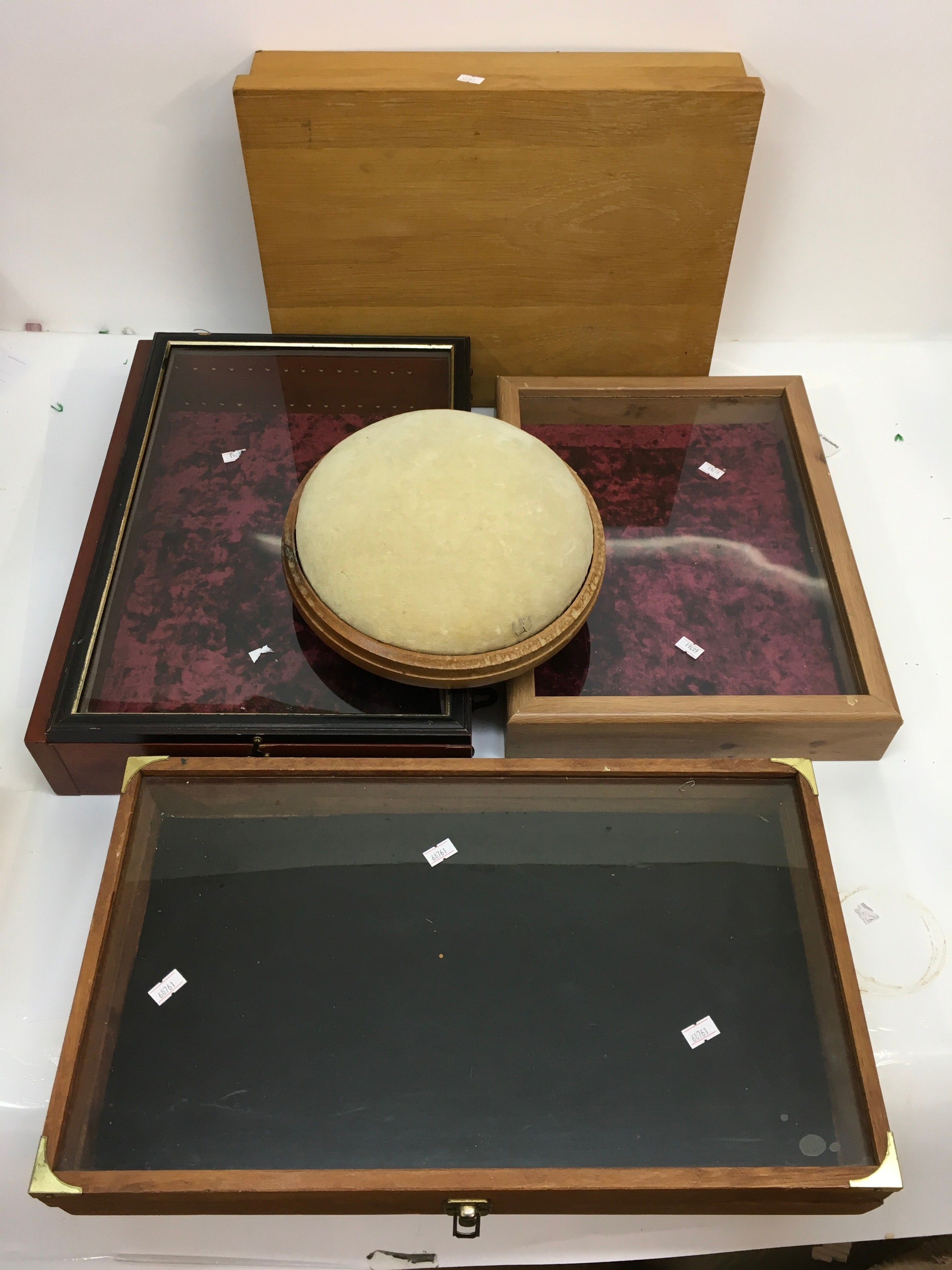 Three glass topped jewellery display cases, plus a conforming wooden box and brooch pad. Approx: L40 to 49cm