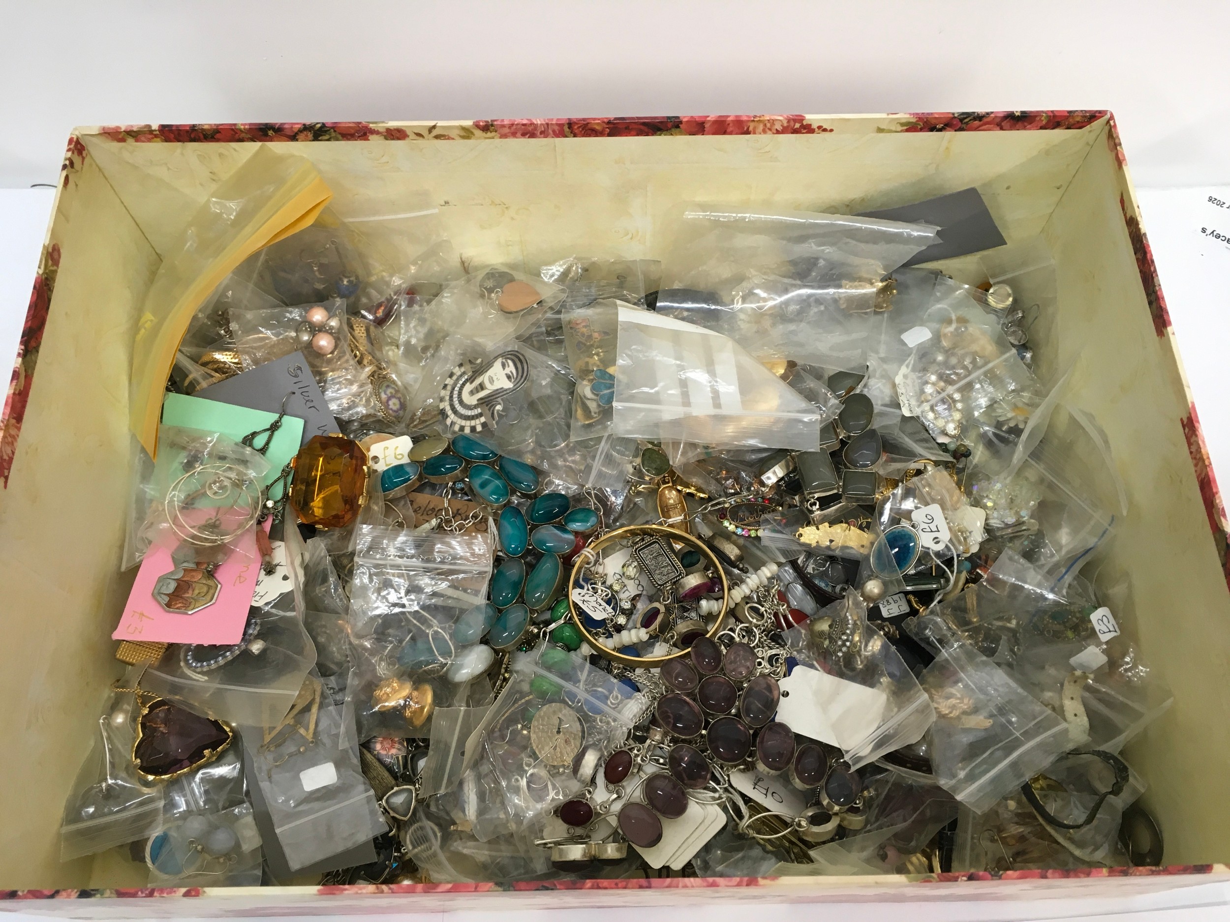 A box of assorted dress jewellery and odds including some vintage example